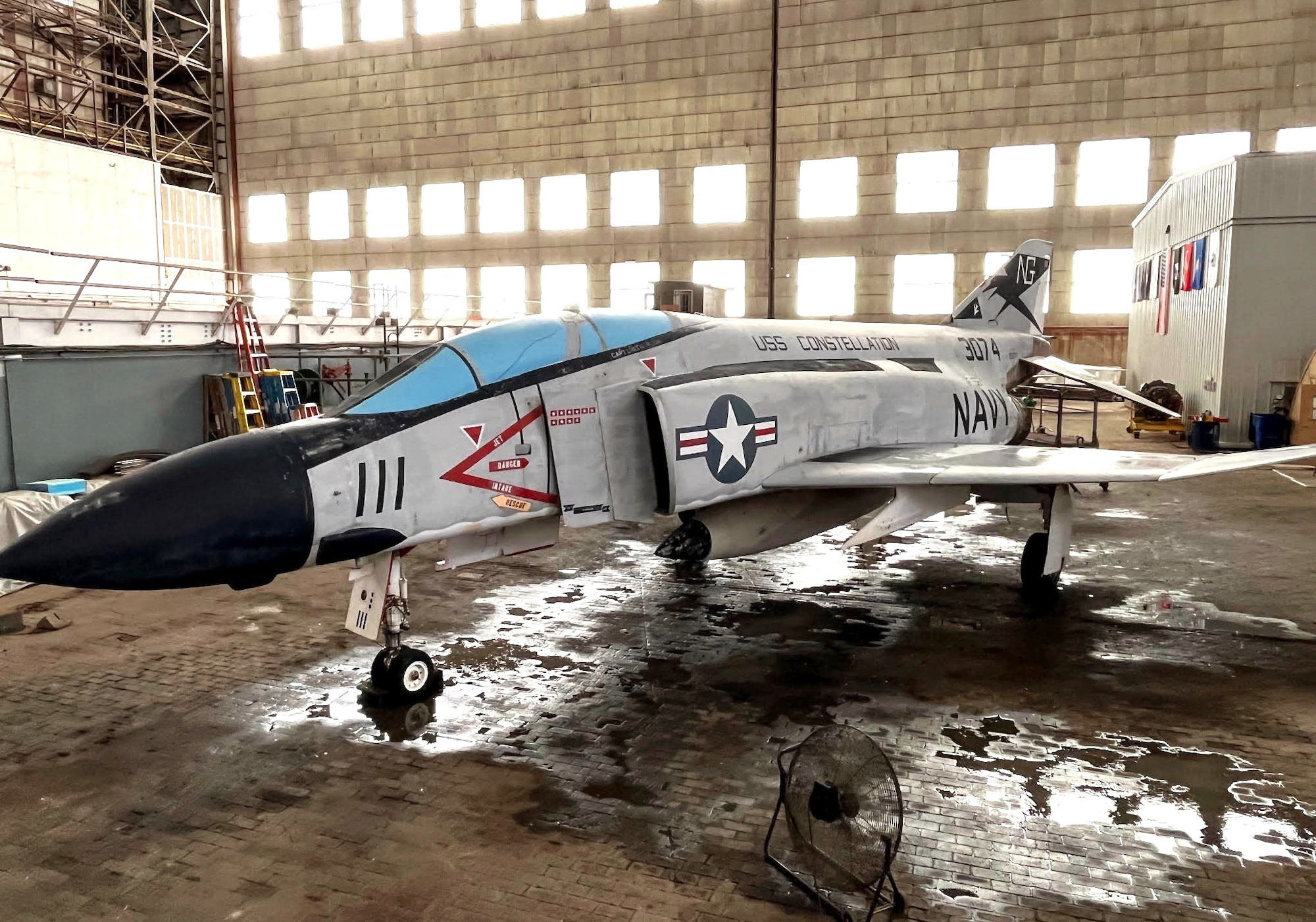 An F-4 Phantom II military aircraft sits in Hangar 1 awaiting restoration by a team of volunteers at Joint Base McGuire-Dix-Lakehurst, N.J., July 13, 2025. The F-4 Phantom II, known for its remarkable speed, payload capacity and advanced radar, was a highly versatile fighter-bomber most notably used during the Vietnam War. (Courtesy photo)