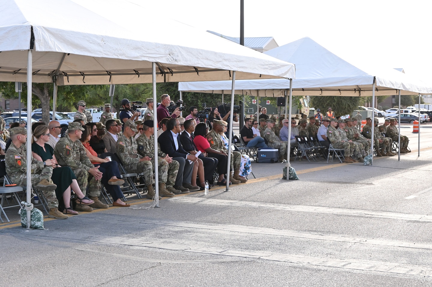 Senior officers and non-commission officers from Fort Bliss, along with representatives from the U.S. Army Corps of Engineers’ Fort Worth District and ICON were joined by local politicians, Fort Bliss personnel and guests for a ribbon-cutting ceremony at the Joint Task Force, Southern Border Campus. The ribbon cutting was for the first of 10 3D-printed buildings to be completed. 
“Together, they offer over 78,000 square feet of covered area that houses up to 560 service members,” said Maj. Gen. Curtis Taylor, Commanding General of the 1st Armored Division. “These facilities were fully 3D-printed in just 58 days and delivered in less than four months. This is the largest deployment of robotic construction capabilities in the history of the Department of War. By leveraging this emerging technology, we built these barracks four times faster than the typical construction model and 9% cheaper than our initial estimates. Saving the American taxpayer over $5.6 million just in overhead. But this project is more than impressive statistics, 3D-printing or cost savings.”