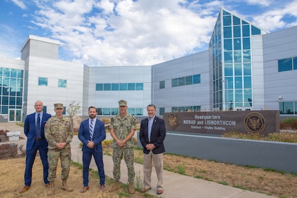 Mr. Mike Buemi, Deputy Assistant Secretary of War for Counternarcotics and Global Threats, center, visits the North American Aerospace Defense Command (NORAD) and U.S. Northern Command (USNORTHCOM) headquarters at Peterson Space Force Base in Colorado Springs, Colorado, July 28, 2026. The visit allowed Buemi and his team to meet with NORAD and USNORTHCOM Strategy, Policy and Plans leadership and discuss the combatant command's ongoing efforts to support U.S. and partner nation law enforcement agencies in countering the illicit activities of transnational criminal organizations.