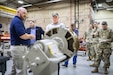 Secretary of the Army Dan Driscoll, looks on as Chris Frank, Letterkenny Army Depot Directorate of Missile and Aerospace Readiness director, talks about the PATRIOT missile during a tour of the depot on July 14.