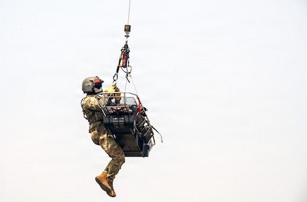 Staff Sgt. Randy Scales, readiness noncommissioned officer, assigned to C Company, 1st Battalion, 189th General Support Aviation Battalion, Montana Army National Guard, rides with a litter during VITA Rescue System training at Fort Harrison, Montana, July 29, 2026.