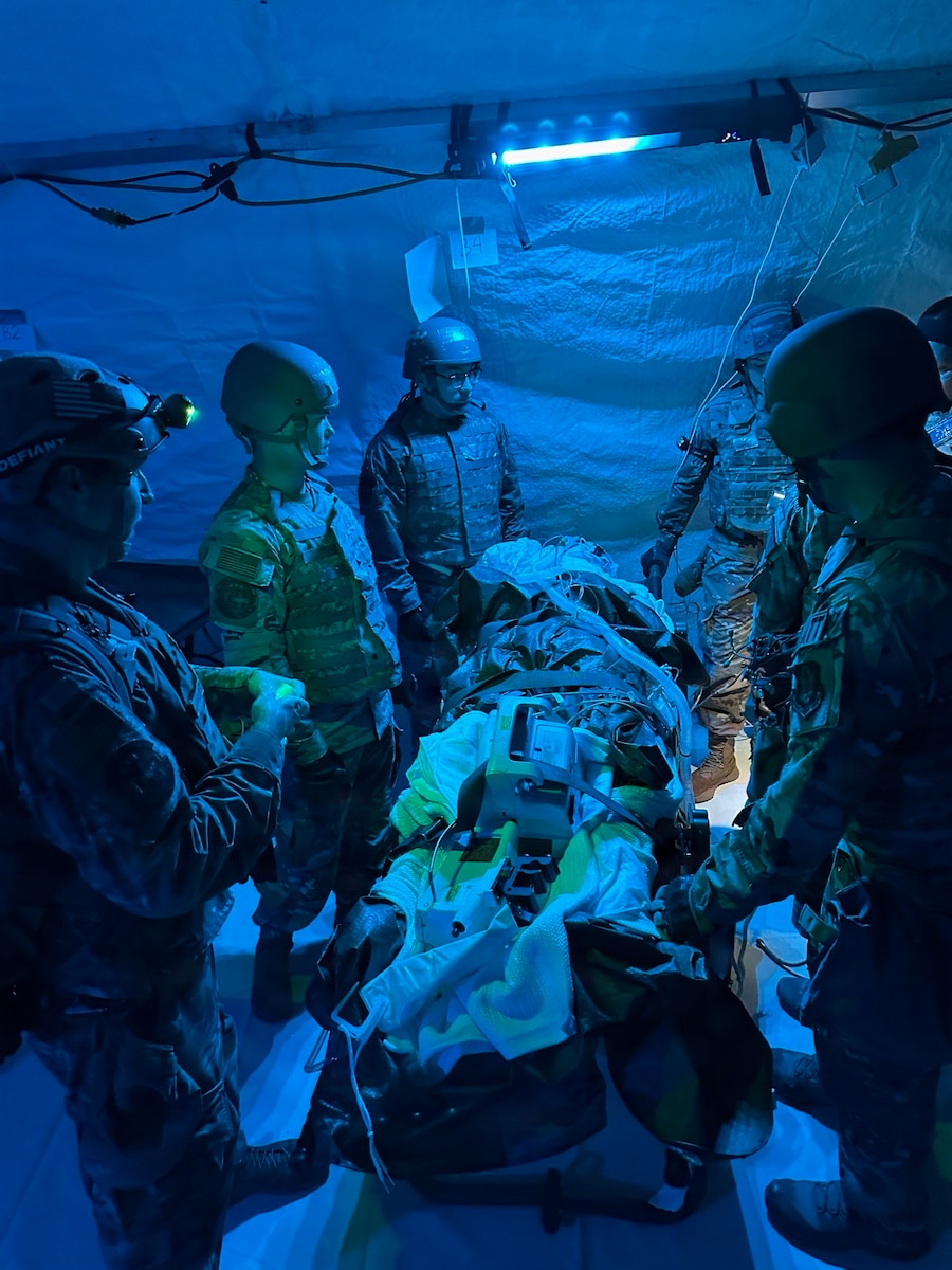 Reserve members stand up an operational medical staging facility from the ground up at Camp Shelby, Miss. during Patriot Medic 2026, which evaluated joint-service readiness, focusing on trauma care, enroute stabilization, and rapid patient evacuation under high-pressure scenarios.. This Patriot Medic is the U.S. Air Force Reserve’s premier annual medical readiness exercise, designed to train and certify Reserve medical personnel in combat and deployment environments. (U.S. Air Force courtesy photo)