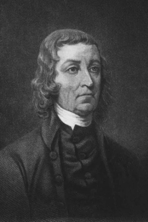 A man wearing a colonial suit.