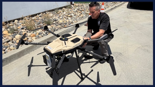 Chief Petty Officer Jason Garrett of the Coast Guard Counter-UAS team sets up a drone interceptor to help safeguard the airspace at the FIFA World Cup match between the USA and Bosnia-Herzegovina on July 1, 2026, in Santa Clara, Calif. The device was designed to be the last line of defense if a malicious drone breached restricted airspace during the event.