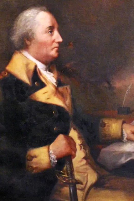 A man wearing a colonial suit.