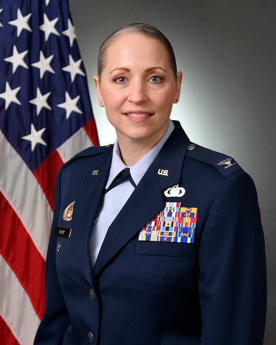 Photo of female Air Force colonel in dress blues.