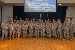 A group of people stand together