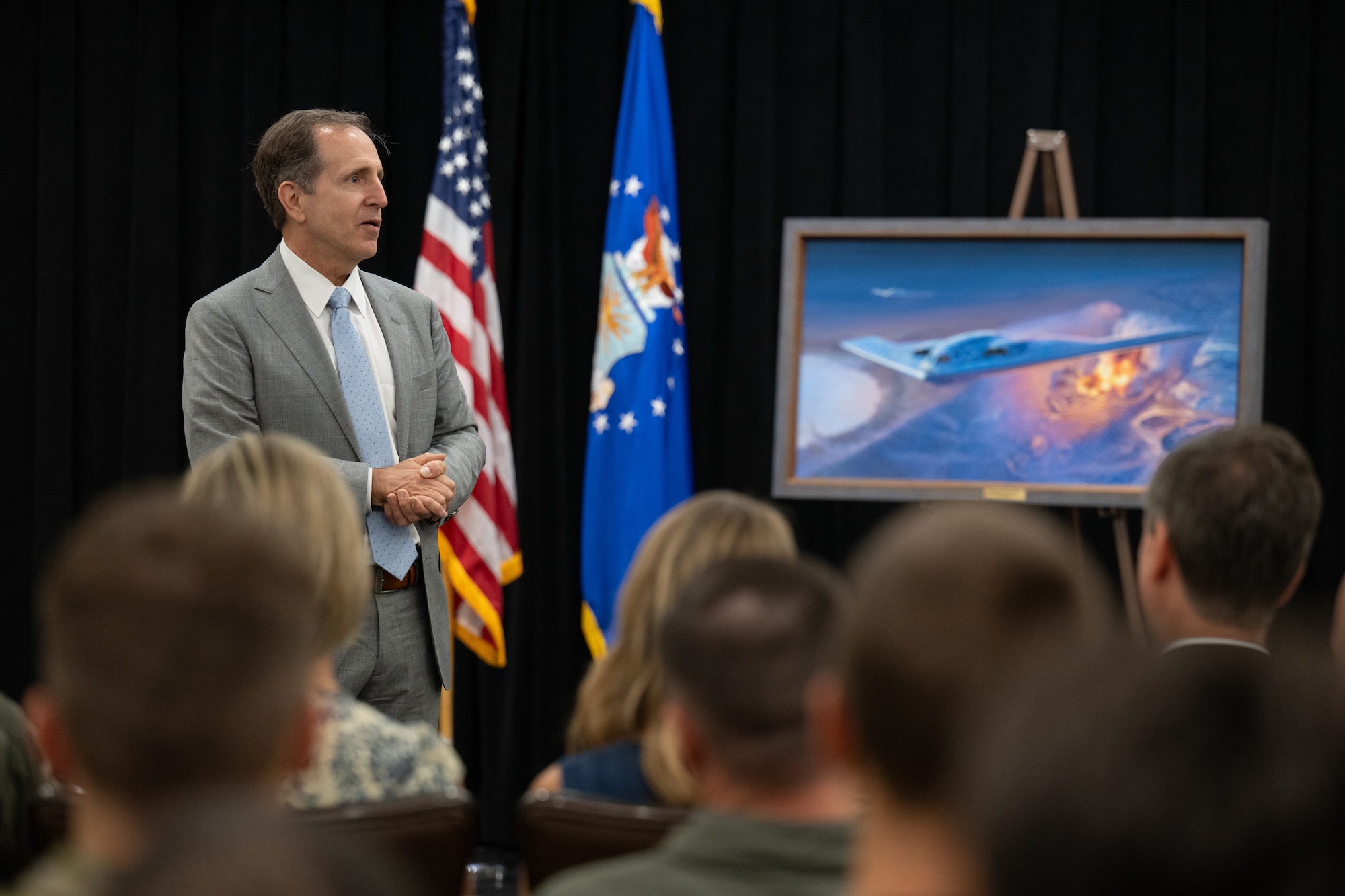 Retired Gen. James Slife, former vice chief of staff of the Air Force, speaks to Airmen assigned to the 509th and 131st Bomb Wings about the impact of Operation Midnight Hammer at Whiteman Air Force Base, Missouri, July 28, 2026. Operation Midnight Hammer saw seven B-2 Spirit bombers deliver an overnight strike on Iranian nuclear facilities, the largest B-2 operational strike in U.S. history. (U.S. Air Force photo by Senior Airman Matthew S. Domingos)