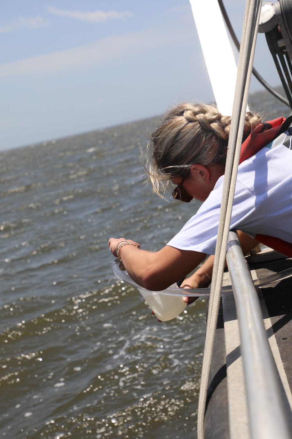 Adalyn Anderson, a summer intern with ERDC, collaborates with researchers from the Coastal and Hydraulics Laboratory (CHL) to collect samples in the field. Under the mentorship of CHL experts, interns gain critical exposure to cutting-edge research supporting both military and civil works missions. (USACE photo by Christopher Northfield)