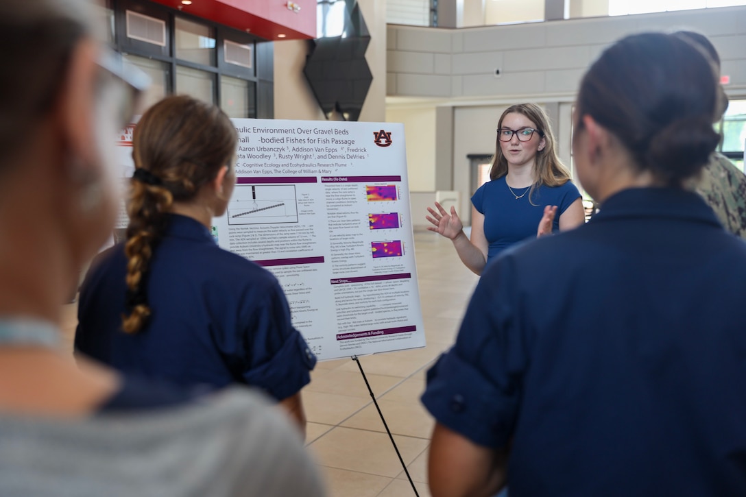 Gaining critical experience, summer interns with ERDC's Environmental Laboratory present their findings during a recent poster session. The program immerses interns in cutting-edge research for both military and civil works missions. (USACE photo by Khary Ratliff)
