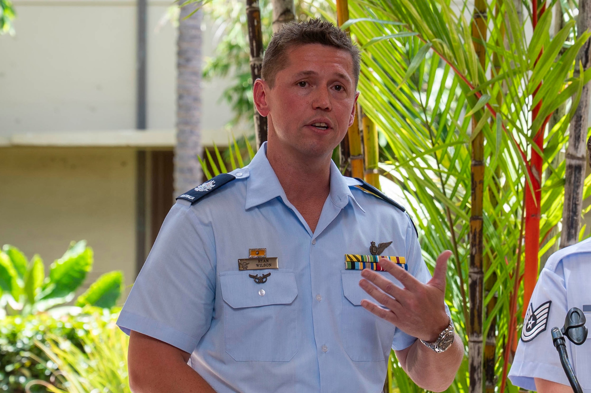 WO Wilson speaks from a podium