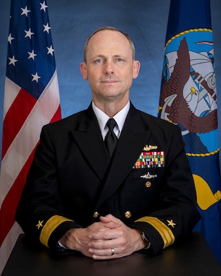 U.S. Navy Rear Adm. David S. Cox, director, U.S. Pacific Fleet Maritime Headquarters and Sustainment, poses for a studio photo at the PACFLT headquarters on Joint Base Pearl Harbor-Hickam, Hawaii, July 30, 2026. (U.S. Navy photo by Mass Communication Specialist 2nd Class Jeremy Boan)