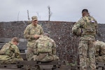 Army Chaplain (Capt.) Brent Sadler, assigned to the 3rd Battalion, 25th Aviation Regiment, 25th Combat Aviation Brigade, conducts a religious service at a range during a training rotation at Pohakuloa Training Area, Hawaii, March 1, 2026. Army chaplains are responsible for providing spiritual, religious and pastoral care, ensuring soldiers' spiritual needs are met so they can complete their mission.