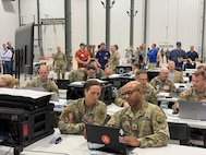 16th Air Force leadership engages with students.