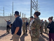 Leadership tours electrical grid.