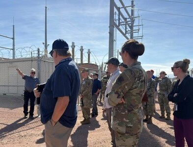 Leadership tours electrical grid.