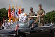Commanding General of III Marine Expeditionary Force, U.S. Marine Corps Lt. Gen. Benjamin Watson, right, and Republic of Korea Marine Corps Lt. Gen. Ju Il-Seok, 37th commandant of the Republic of Korea Marine Corps, ride in a parade car during a tour of ROK Marine Corps headquarters in Hwaseong, South Korea, July 24, 2026. Watson toured the base to discuss bilateral training operations as a part of Korean Marine Exchange Program 26.2. The Korean Marine Exchange Program is a semiannual bilateral exercise designed to improve combined readiness, strengthen the Republic of Korea–U.S. alliance and promote stability in the Indo-Pacific region. (U.S. Marine Corps photo by Lance Cpl. Marcus Henson)