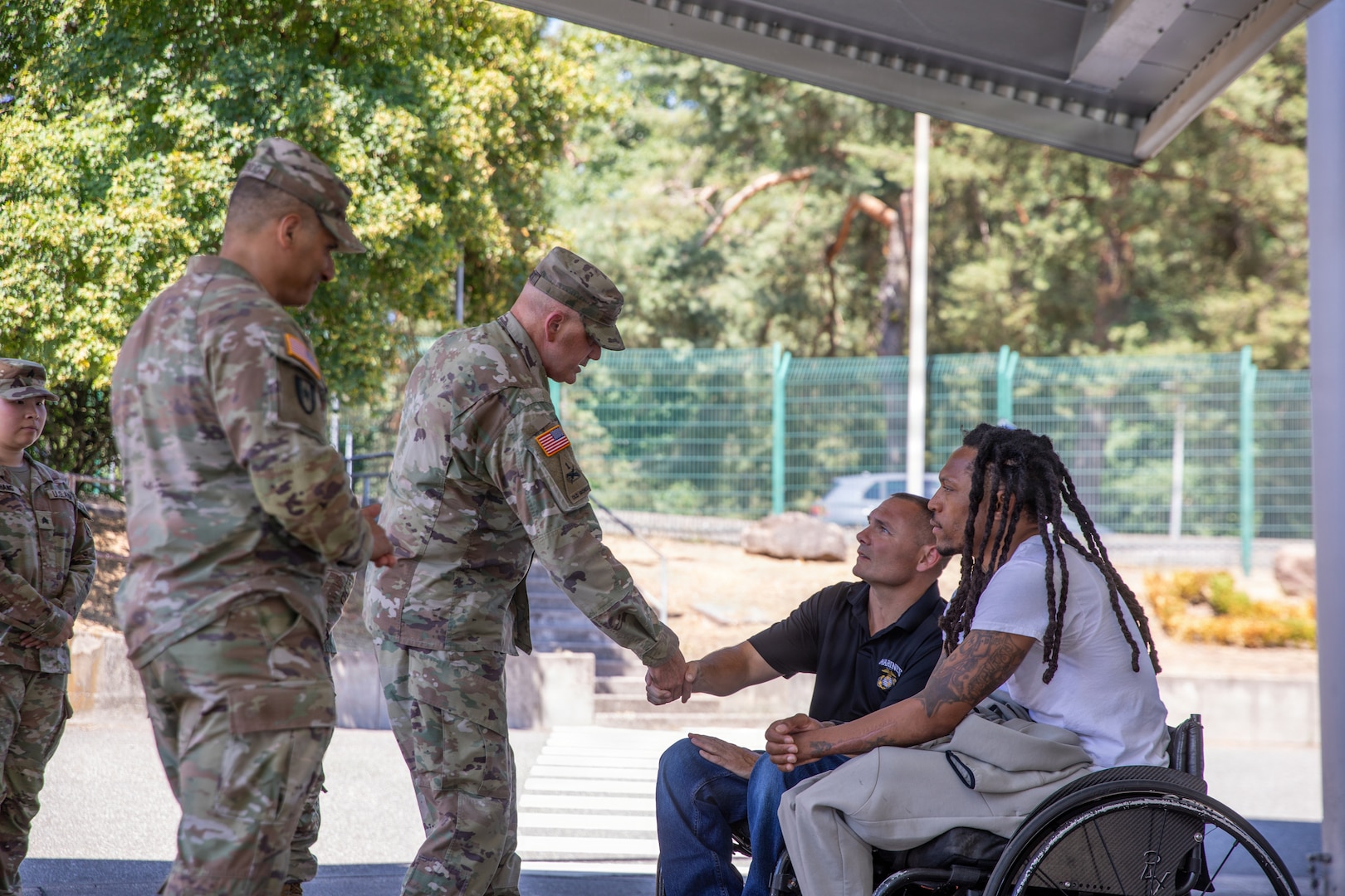 U.S. Marine Corps veterans Lance Cpl. Michael DeLancey and Sgt. Anthony McDaniel visit Landstuhl Regional Medical Center in Landstuhl, Germany, July 29, 2026. During their visit, the Marines met with LRMC staff and toured the medical center where they received care after sustaining combat injuries during military service overseas. The visit highlighted the lasting connection between wounded service members and the military medical professionals who supported their recovery.(DoD Photo by Travis Jones)