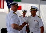 Capt. Colin Price, left, shakes hand with Capt. Harry C. Evans III at a change of command ceremony where Evans relieves Price as commanding officer of Blue Ridge-class command and control ship USS Mount Whitney (LCC 20) in Gaeta, Italy, July 31, 2026. Mount Whitney, forward deployed to Gaeta, Italy, operates with a combined crew of U.S. Sailors and Military Sealift Command civil service mariners in the U.S. 6th Fleet area of operations in support of U.S. national security interests in Europe and Africa. (U.S. Navy photo by Mass Communication Specialist 1st Class Isaac Esposito)