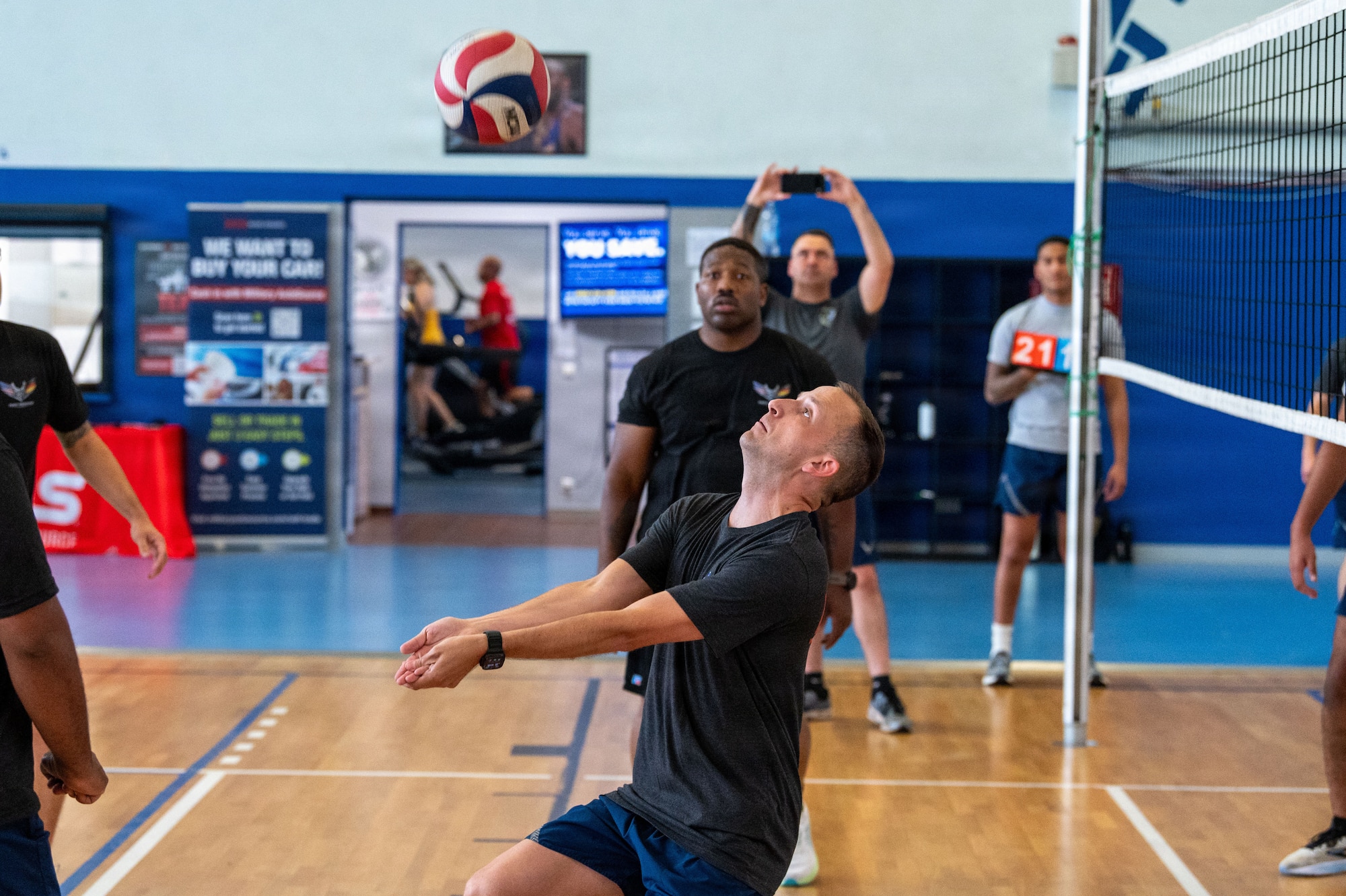 U.S. Air Force Master Sgt. Eric Leatham, 86th Civil Engineer Squadron first sergeant, passes the ball during a volleyball match.