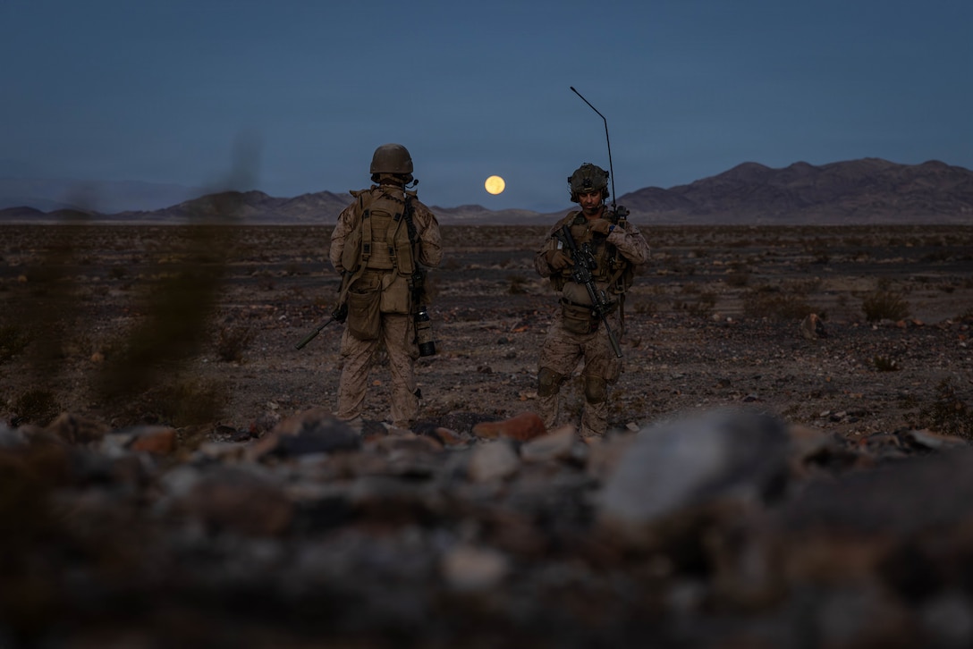 U.S. Marines with Golf Company, 2nd Battalion, 2nd Marine Regiment, 2nd Marine Division, prepare to conduct a live-fire company attack on Range 400 during Service Level Training Exercise 4-26 on Marine Corps Air Ground Combat Center, Twentynine Palms, California, July 29, 2026. SLTE 4-26 is designed to be a challenging, realistic training environment that produces combat-ready forces capable of operating as an integrated Marine Air Ground Task Force across all domains of military operations. (U.S. Marine Corps photo by Sgt. Alexis French)