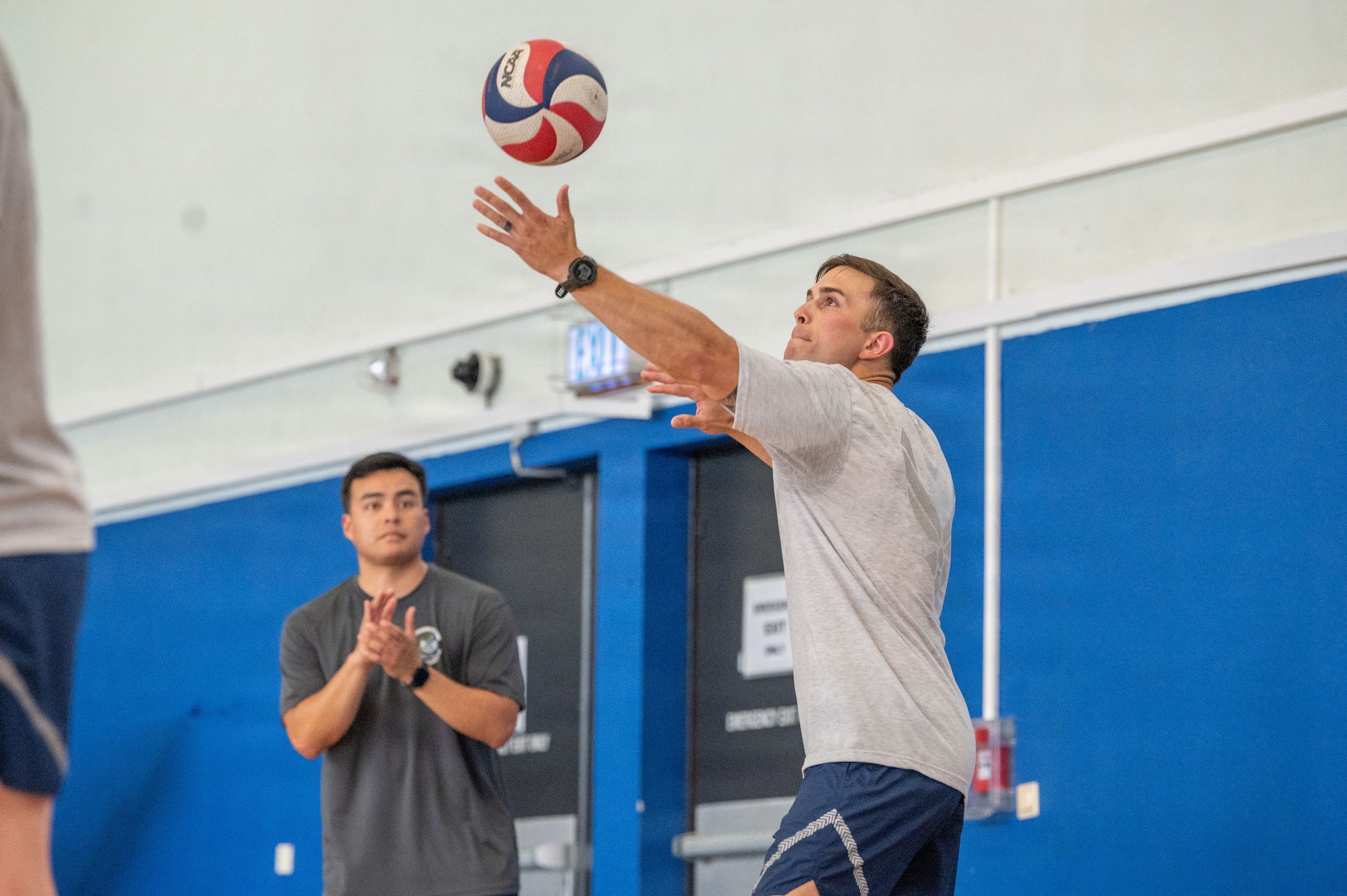 U.S. Air Force Senior Airman Daniel Lance, 86th Operations Support Squadron Survival, Evasion, Resistance and Escape specialist, serves the ball during a volleyball match.