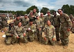 Landstuhl Regional Medical Center Soldiers pose for a group photo after completing the The 108th annual Nijmegen Four Days Marches, known as the "Walk of the World," took place July 21-24, with more than 47,000 participants, including over 6,500 service members from 77 different countries. Participants marched 100 miles (160 kilometers) over four consecutive days.