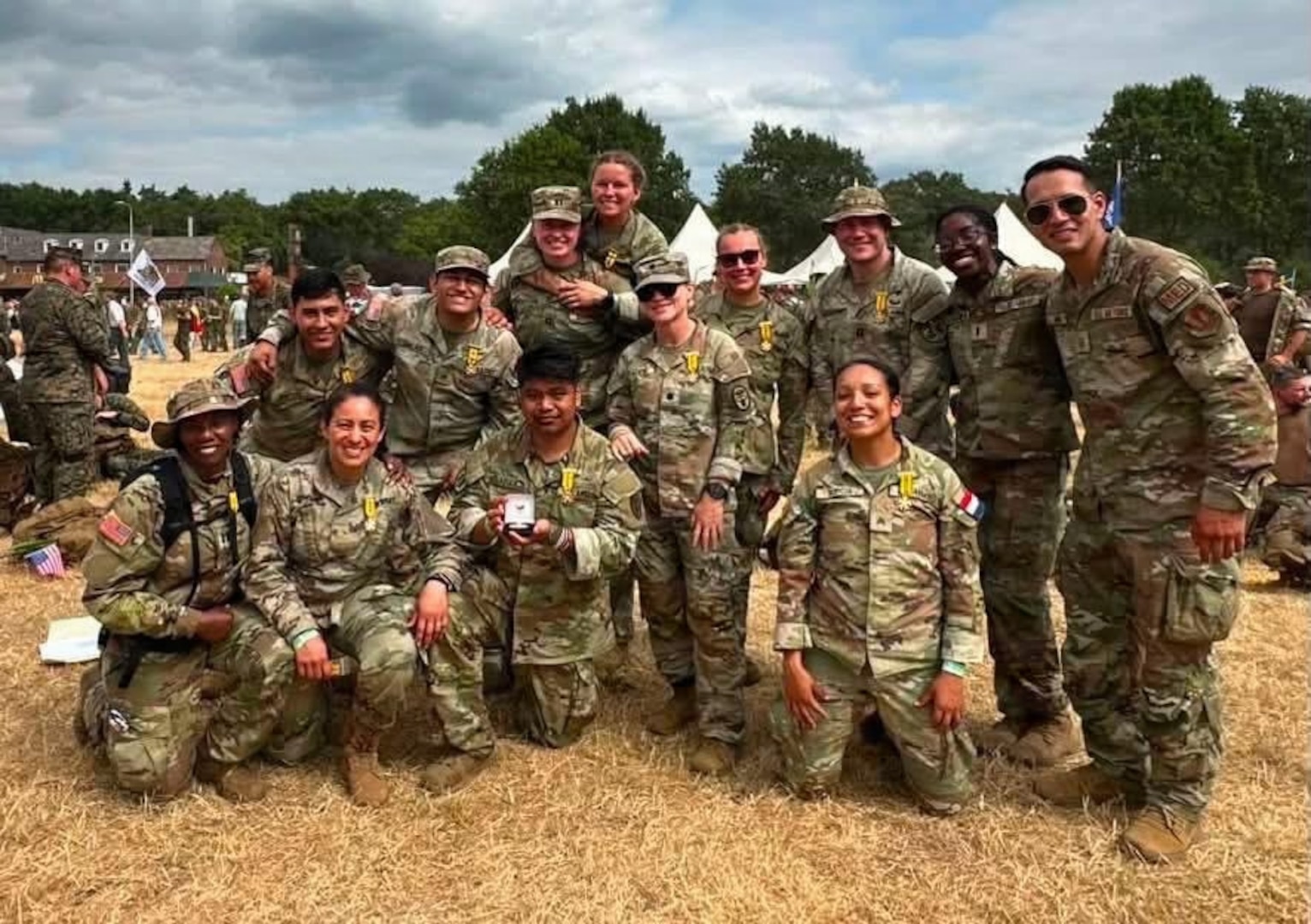 Landstuhl Regional Medical Center Soldiers pose for a group photo after completing the The 108th annual Nijmegen Four Days Marches, known as the "Walk of the World," took place July 21-24, with more than 47,000 participants, including over 6,500 service members from 77 different countries. Participants marched 100 miles (160 kilometers) over four consecutive days.
