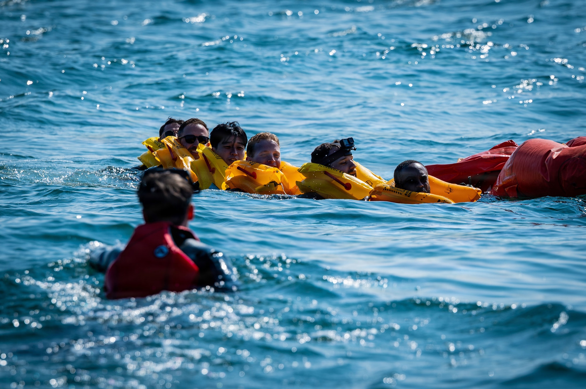 U.S. Airmen participate in survival, evasion, resistance, and escape training at Caister-on-Sea, England, July 23, 2026.