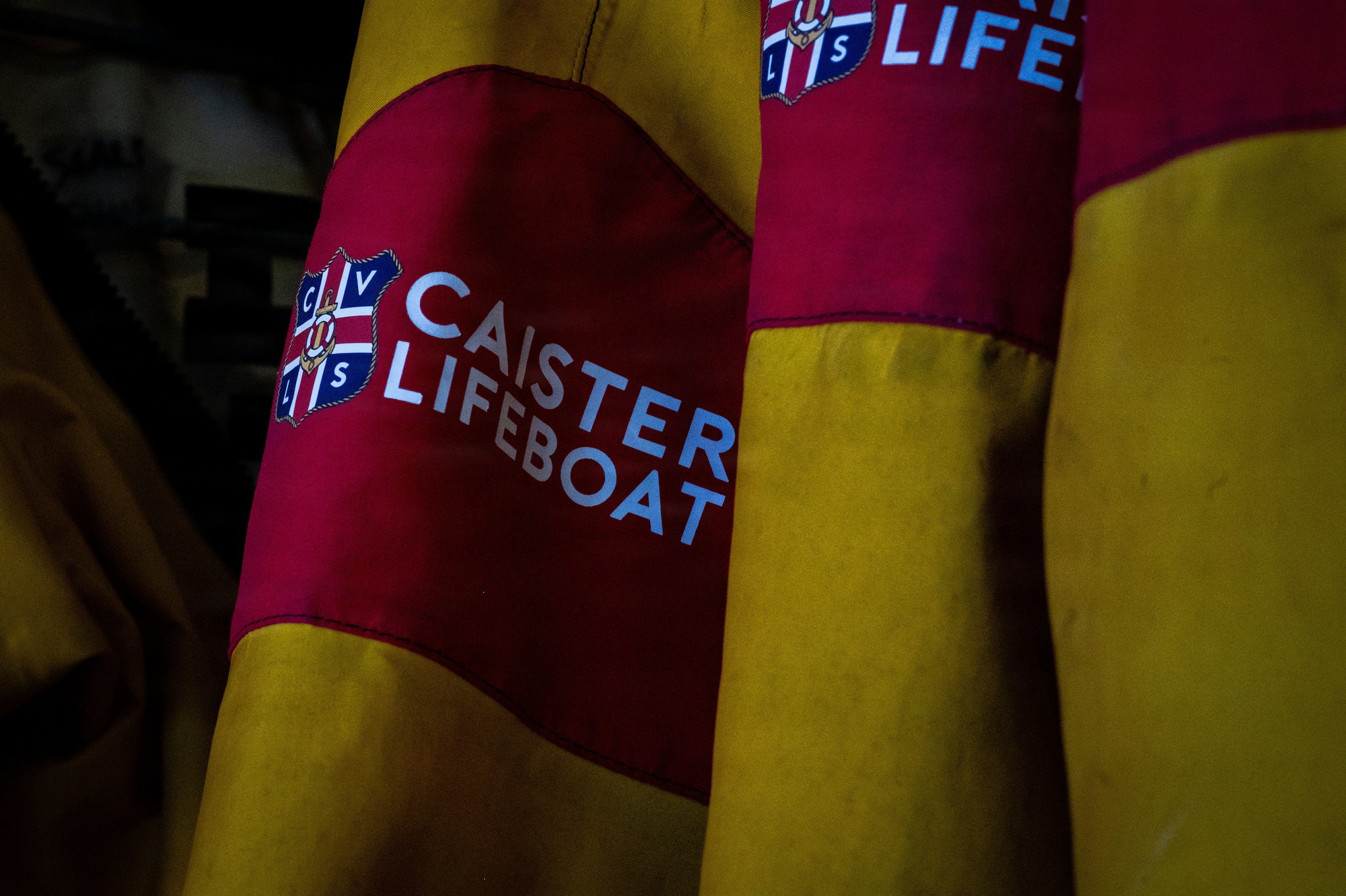 Weather protection gear hangs at the Caister Lifeboat Volunteer Service visitor center during a joint survival, evasion, resistance, and escape training with U.S. Airmen at Caister-on-Sea, England, July 23, 2026.