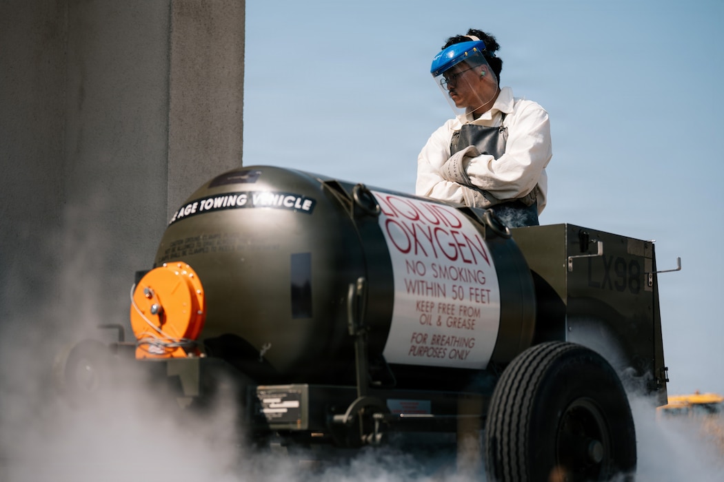 U.S. Air Force Senior Airman Dino Reyes, 86th Maintenance Squadron electrical and environmental journeyman, monitors a liquid oxygen servicing cart at Ramstein Air Base, Germany, July 30, 2026