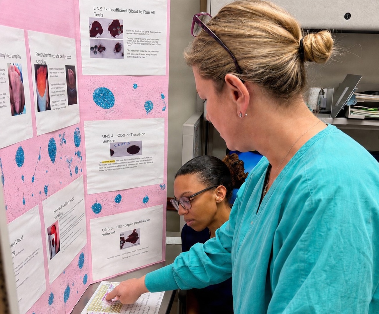 A lab specialist instructs staff on proper newborn metabolic screening specimen collection during the LDRP Skills Fair.