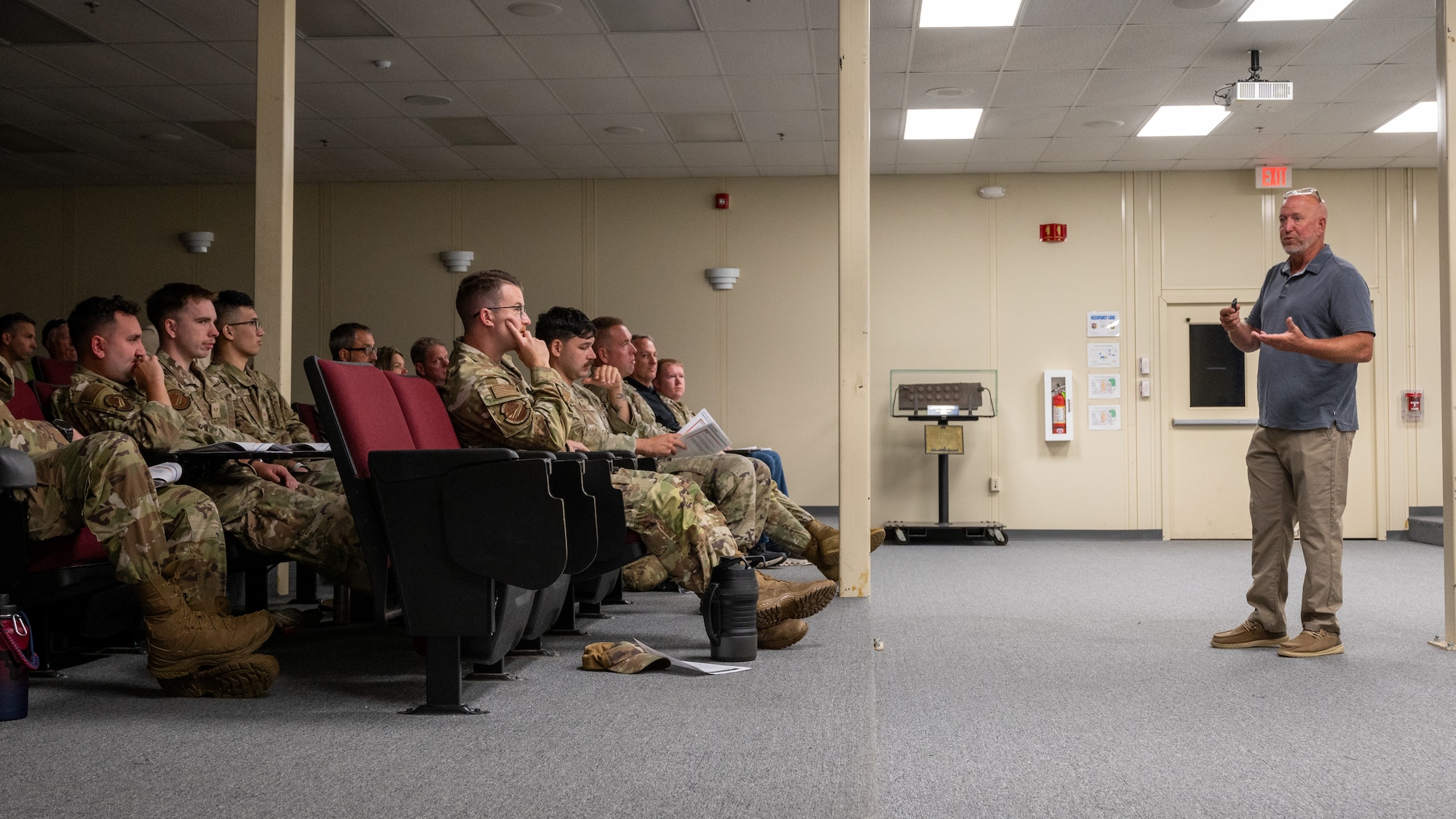 Paul Gebert, Precision Planning and Simulations lead facilitator, speaks to service members and civilians from various units during the classroom portion of the spill response exercise at Joint Base McGuire-Dix-Lakehurst, N.J., July 14, 2026.