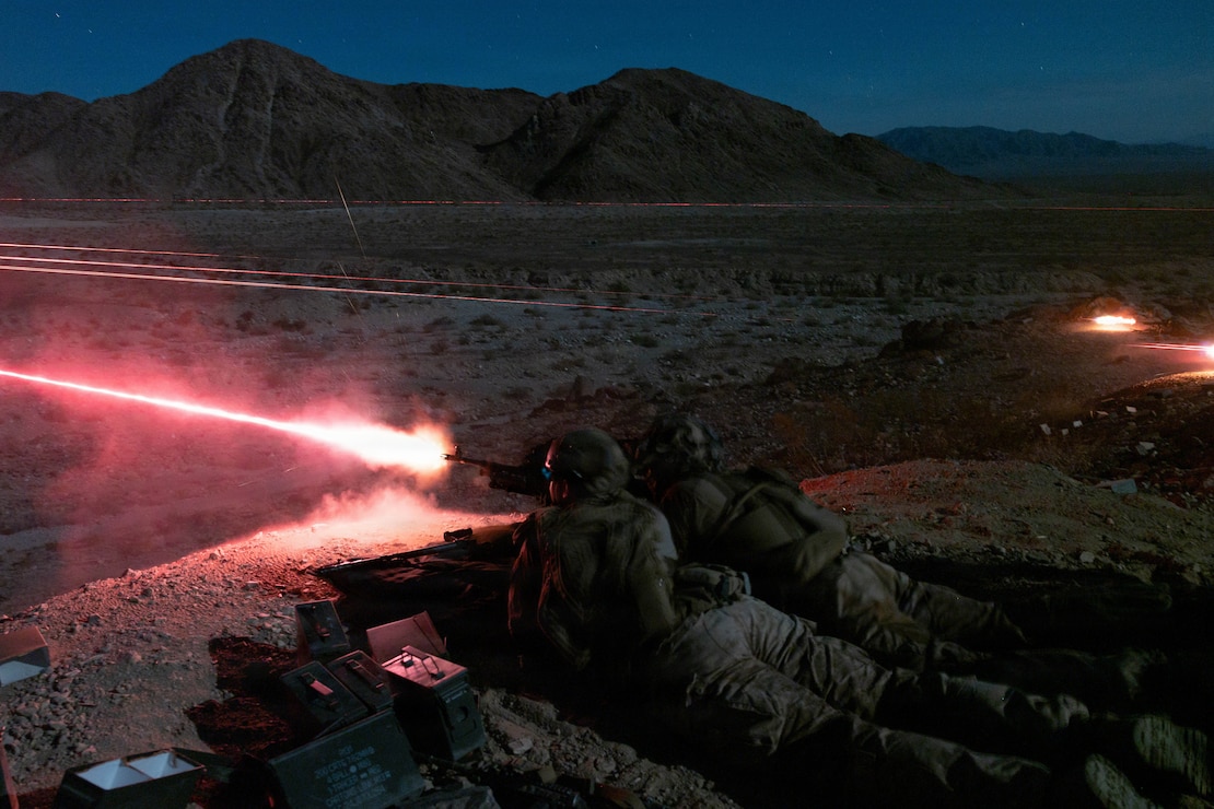 U.S. Marines with 2nd Battalion, 5th Marine Regiment, 1st Marine Division, fire M240B machine guns during night live-fire company attacks as part of Service Level Training Exercise 4-26 at Range 400, MCAGCC, Twentynine Palms, California, July 24, 2026. SLTE is a premier training event that ensures the Marine Corps remains a highly lethal, adaptable force capable of dominating the future multi-domain fight. (U.S. Marine Corps photo by Lance Cpl. Grant Gatlin)