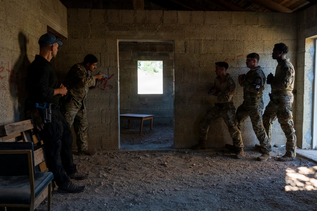 A member of the Hessian State Criminal Investigation Office instructs U.S. Airmen during a bilateral urban tactical and close-quarters training at the McCully Barracks Military Operations on Urban Terrain site, Germany, July 28, 2026.