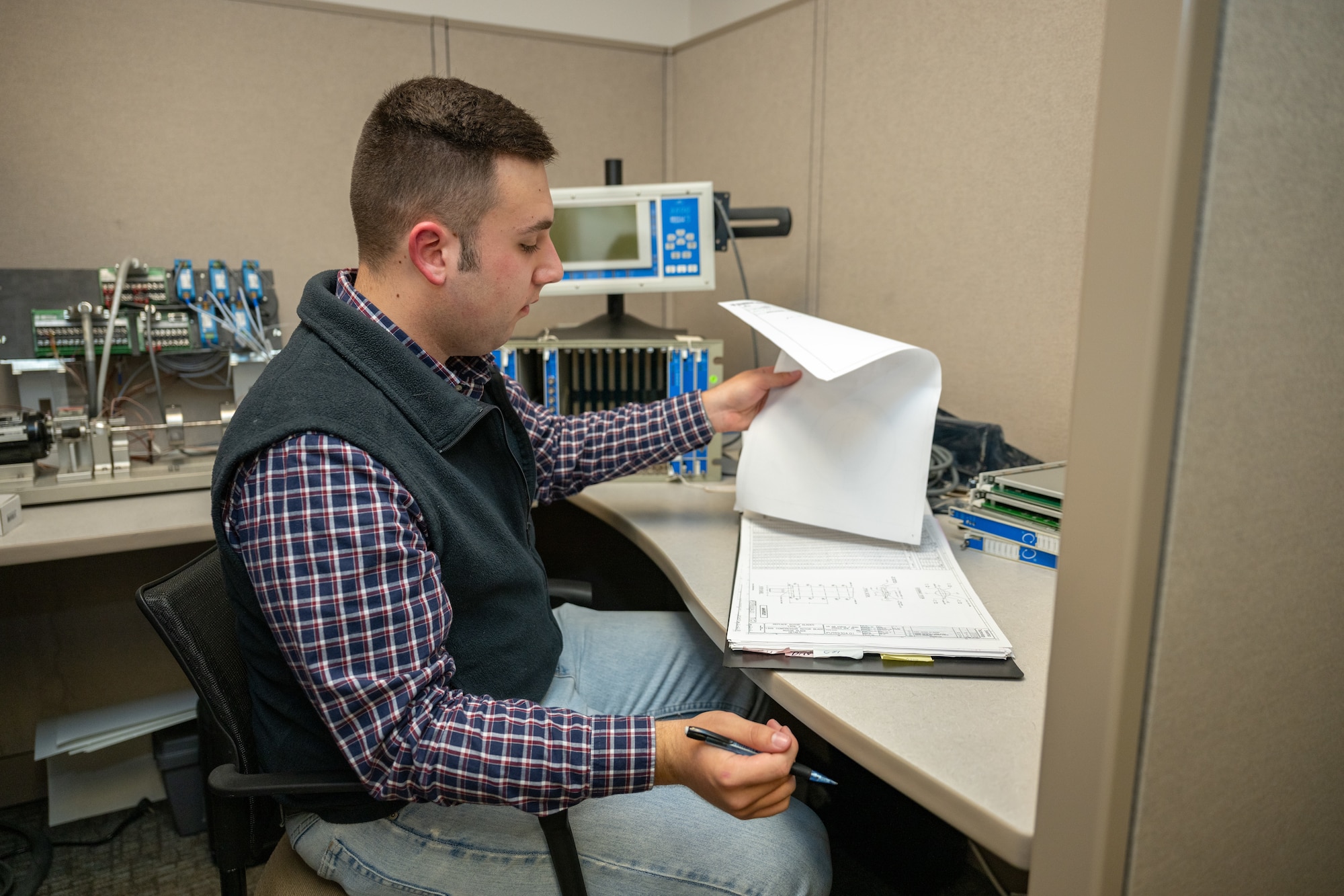 While organizing drawings at the von Kármán Gas Dynamics Facility at Arnold Air Force Base, Baskin came across a drawing that caught his eye. The originator of the drawing was his grandfather, Wayne Morton, who worked for more than four decades at Arnold AFB. To Owen’s surprise, Morton completed the drawing as an intern at the base around the same age as Baskin is now. Baskin stated finding the picture was meaningful, as he was close to his grandfather, who had passed just a month before he started his internship. (U.S. Air Force Photo by Keith Thornburgh)
