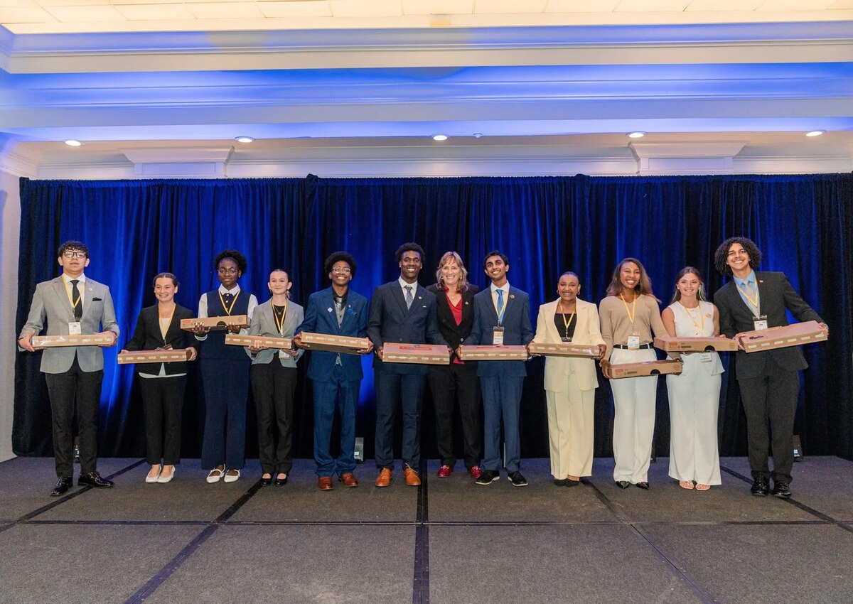 Eglin Air Force Base’s 2026 Youth of the Year Mia Petrovich (center) gathers with supporters and Boys & Girls Clubs of America representatives.
