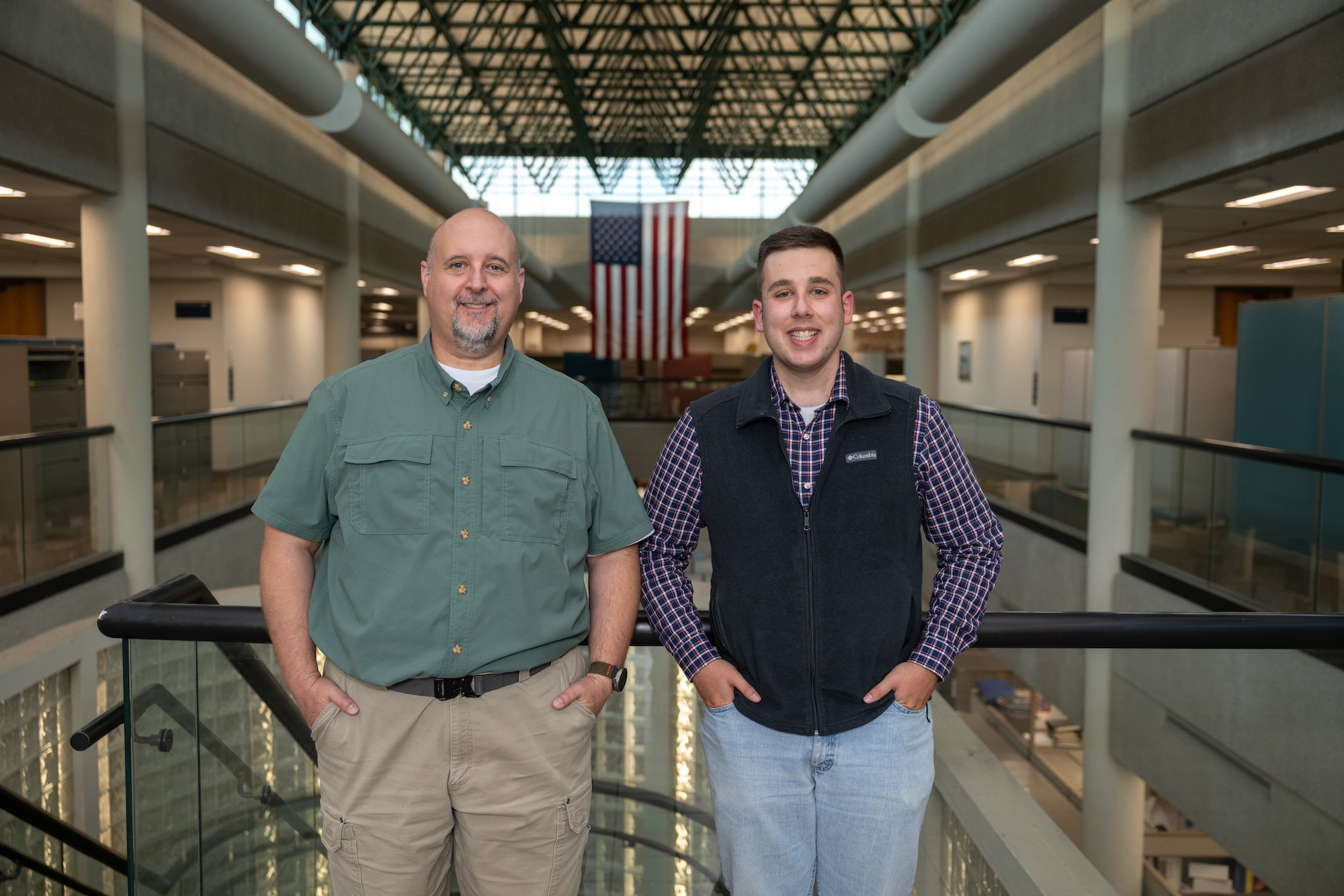 Along with his grandfather Wayne Morton, Owen Baskin, right, an intern with Beyond New Horizons, the Arnold Engineering Development Complex Test Operations and Sustainment contractor, has other family members who have been employed at Arnold Air Force Base over the years including his father, Buck Baskin, left. Baskin said he has always known the base was a special place, and his internship here has shown him just how many paths an engineering degree can lead to. (U.S. Air Force Photo by Keith Thornburgh)