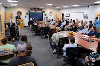 Mr. Bernard Kelm, U.S. Naval Research Laboratory (NRL) Acting Director of the Naval Center for Space Technology, addresses NRL personnel, family and alumni at the commemoration of the 70th anniversary of the Blossom Point Tracking Facility in Welcome, Md., July 30, 2026. The facility provides round-the-clock operations utilizing full automation and enables "lights-out" satellite contacts. (U.S. Navy Photo by Sarah Peterson)