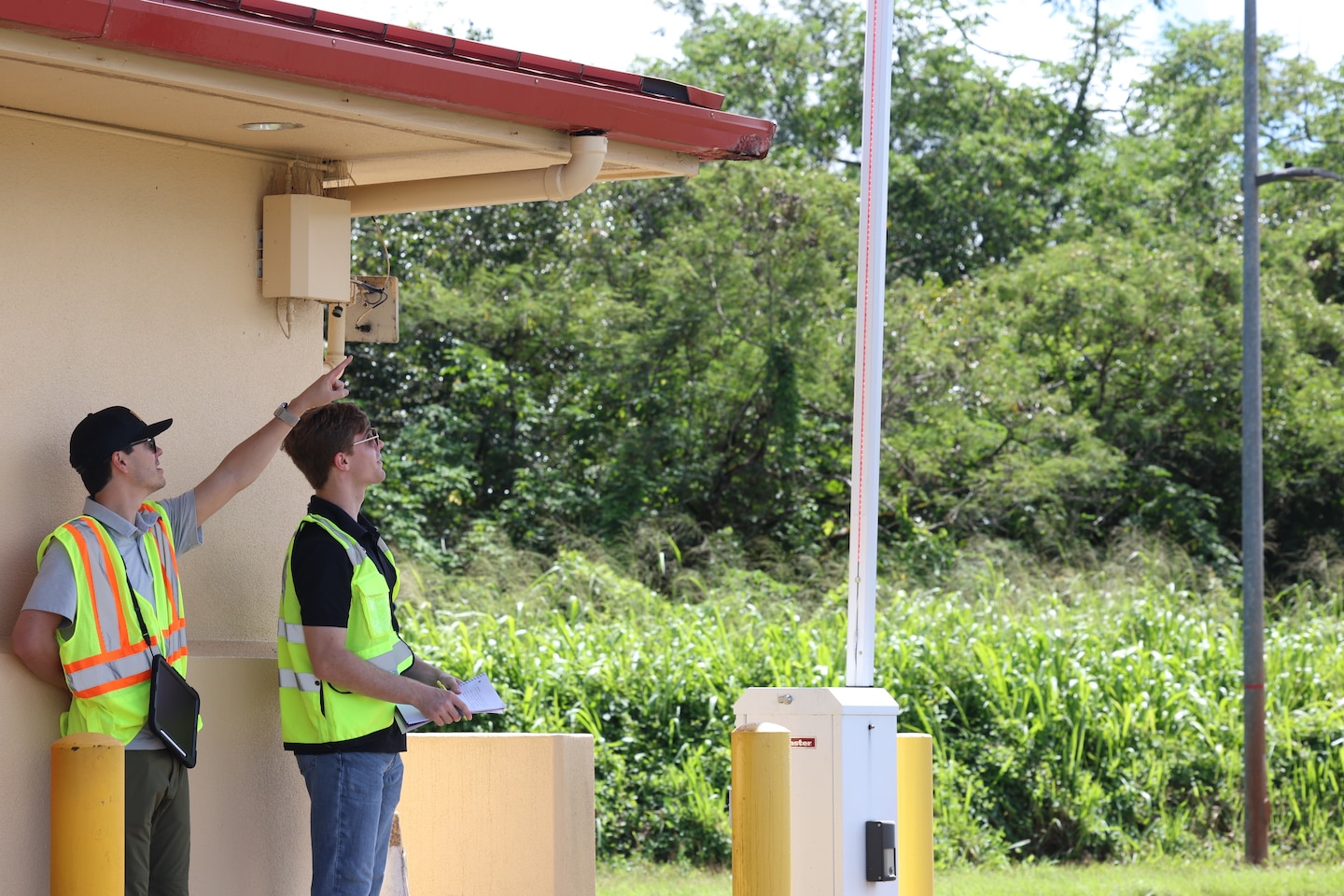 U.S. Army Engineering and Support Center, Huntsville engineers inspect a vehicle access control barrier arm at a military installation on the island of Oahu, Hawaii, May 12, 2026.