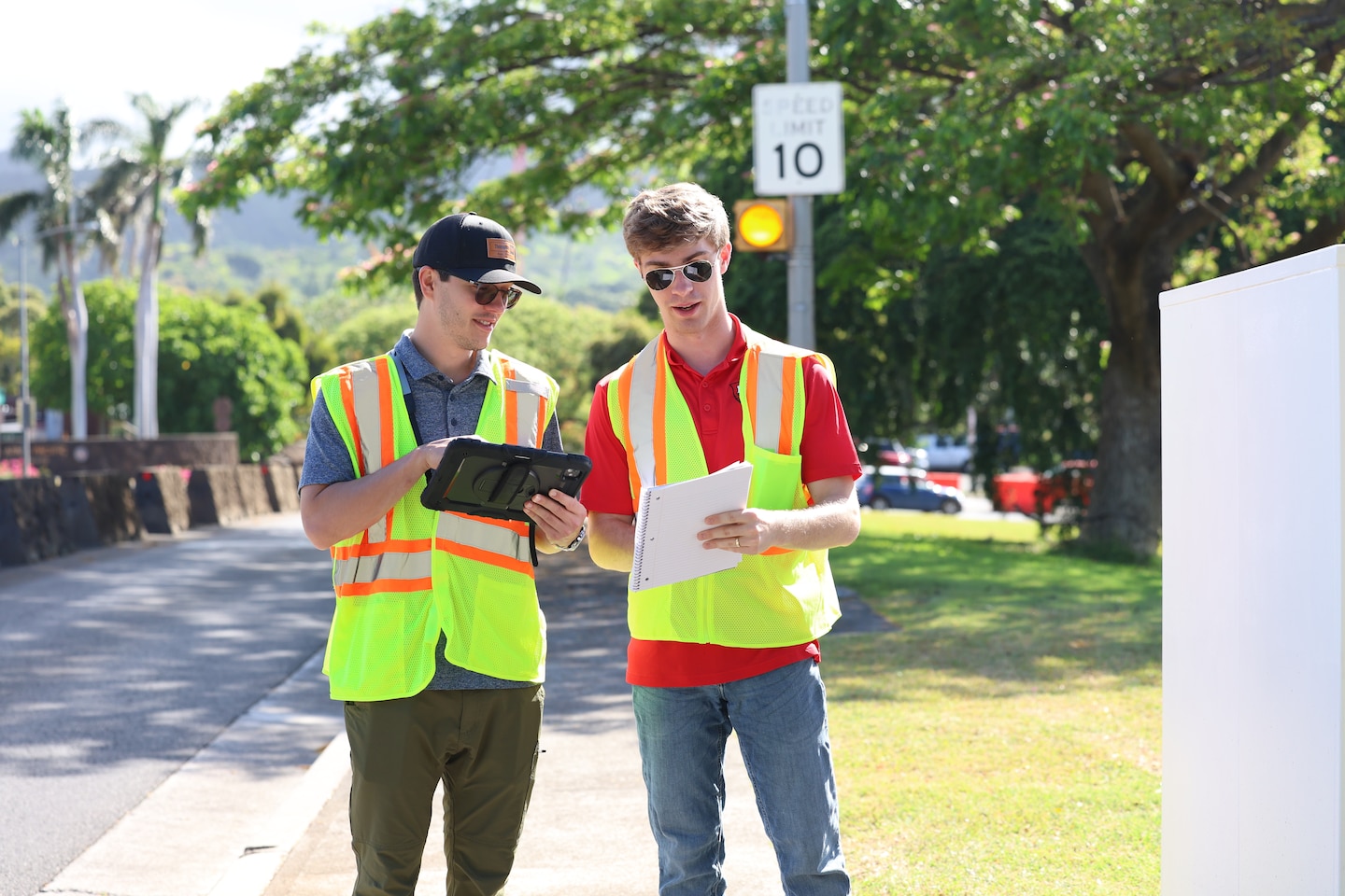 U.S. Army Engineering and Support Center, Huntsville engineers discuss their evaluation of an outdoor electrical control box for installation barriers at a military installation on the island of Oahu, Hawaii, May 13, 2026.