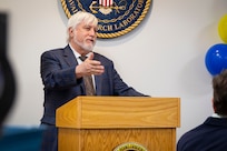 Dr. Bruce Danly, U.S. Naval Research Laboratory (NRL) Director of Research, addresses NRL personnel, family and alumni at the commemoration of the 70th anniversary of the Blossom Point Tracking Facility in Welcome, Md., July 30, 2026. The facility provides round-the-clock operations utilizing full automation and enables "lights-out" satellite contacts. (U.S. Navy Photo by Sarah Peterson)