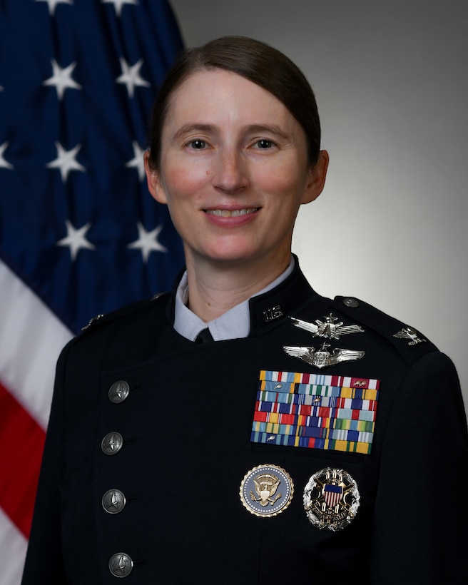Gunn-Golkin, Anna in uniform with flag