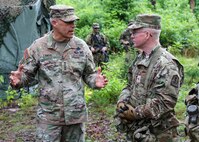 Gen. Christopher C. LaNeve, acting chief of staff of the Army, and Sgt. Maj. of the Army Michael R. Weimer, the 17th sergeant major of the Army, visit Virginia Army National Guard Soldiers assigned to the Staunton-based 116th Mobile Brigade Combat Team during a training rotation at the Joint Readiness Training Center at Fort Polk, Louisiana, June 16, 2026.