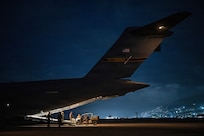 U.S. Air Force Airmen prepare to transport U.S. Marines and equipment aboard a C-17 Globemaster III before departing Simón Bolívar International Airport at Maiquetía, Venezuela, July 16, 2026. At the direction of U.S. Southern Command, the military is supporting State Department-led U.S. disaster assistance for the people of Venezuela following the June 24 earthquakes. (U.S. Air Force photo by Tech. Sgt. Devin M. Rumbaugh)