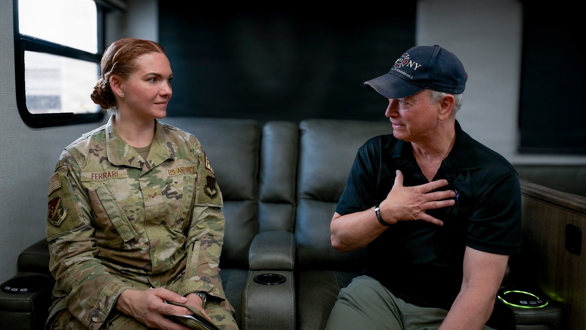 Senior Airman Michelle Ferrari, a 49th Wing public affairs specialist, interviews actor and humanitarian Gary Sinise during his visit to Holloman Air Force Base, N.M., July 12, 2026. Sinise discussed his support for the military community through the Gary Sinise Foundation and Lt. Dan Band performances, which honor service members, veterans, first responders and their families. (U.S. Air Force photo by Airman 1st Class Ariana Barreto)