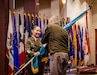 Maj. Gen. Lori Robinson relinquishes the U.S. Army Aviation and Missile Command guidon to Lt. Gen. Chris Mohan, commanding general of U.S. Army Materiel Command, during a relinquishment of command ceremony at Redstone Arsenal, Ala., July 31, 2026. Robinson relinquished command of AMCOM before retiring after 32 years of Army service.