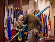 Maj. Gen. Lori Robinson relinquishes the U.S. Army Aviation and Missile Command guidon to Lt. Gen. Chris Mohan, commanding general of U.S. Army Materiel Command, during a relinquishment of command ceremony at Redstone Arsenal, Ala., July 31, 2026. Robinson relinquished command of AMCOM before retiring after 32 years of Army service.