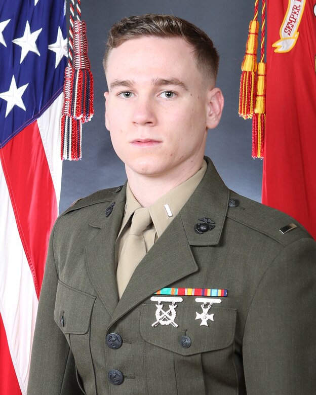 First Lieutenant John R. Matthews, Inspector-Instructor,
Truck Company, 25th Marine Regiment