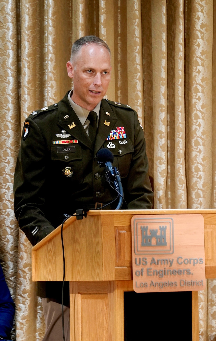 Col. Andrew Baker, outgoing commander of the U.S. Army Corps of Engineers Los Angeles District, delivers remarks during a change of command ceremony July 31 at Fort MacArthur in San Pedro, California. Baker relinquished command to Col. Joshua Bost after leading the district since July 2023.